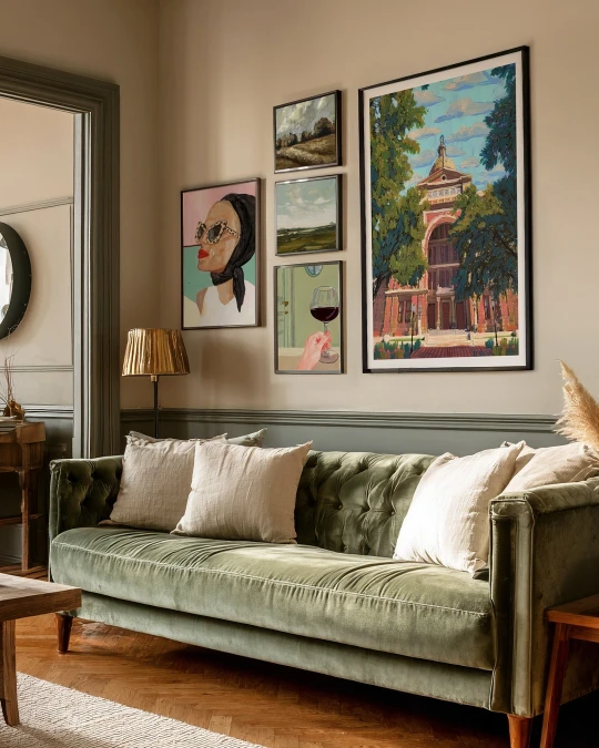 Eclectic Asymmetrical Gallery Wall Over Olive Velvet