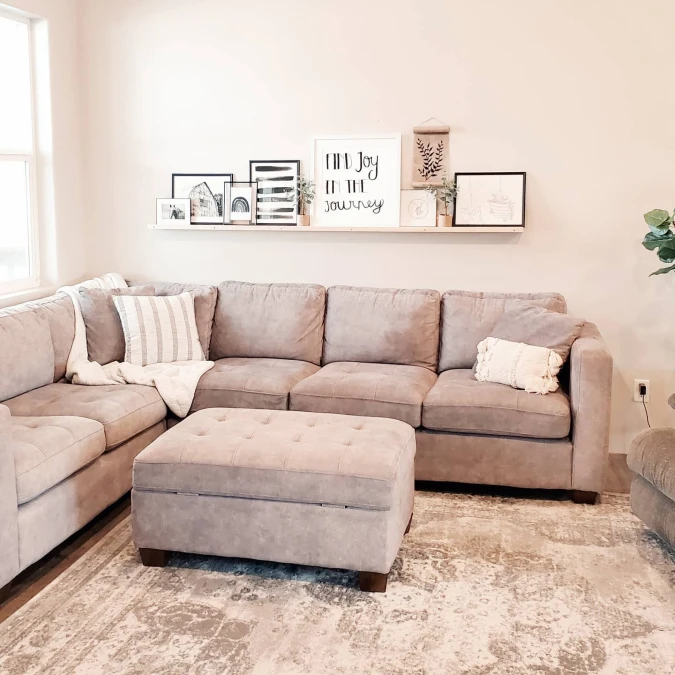 Extra Long Picture Ledge With Layered Monochromatic Art