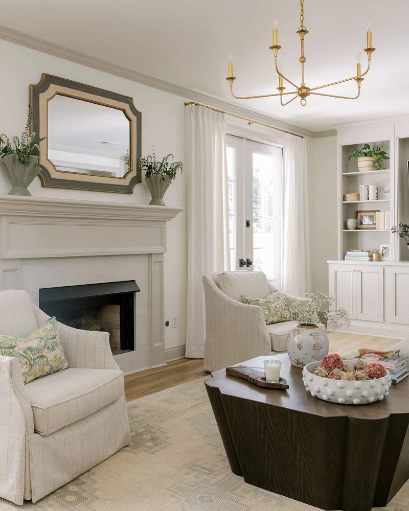 Fireplace Wall with Matching Swivel Chairs and Soft Symmetry