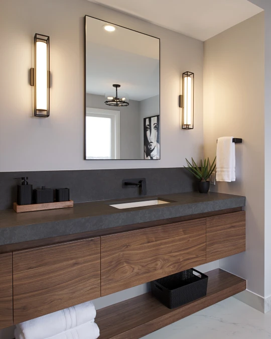Floating Walnut Cabinets and Charcoal Stone