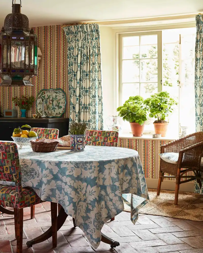 Floral Tablecloth with Striped Wallpaper and Intricate Lantern
