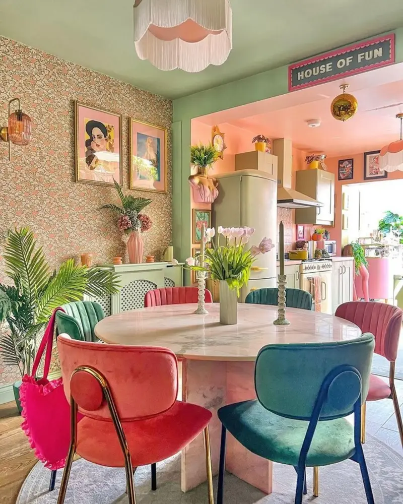 Floral-Walled Dining Room with Velvet Chairs and Marble Table