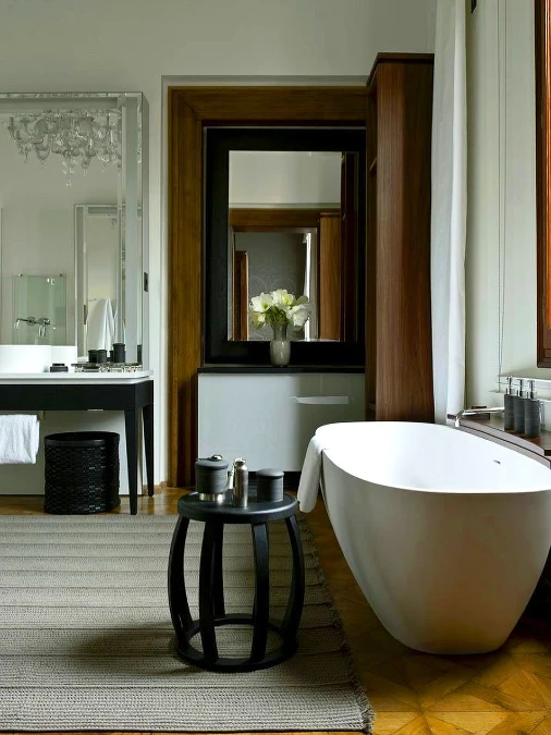 Freestanding Black Furniture and Warm Wood Floors