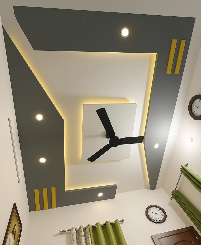 Geometric Charcoal Drop Ceiling with Yellow Accents and Integrated LED Recessed Tracks