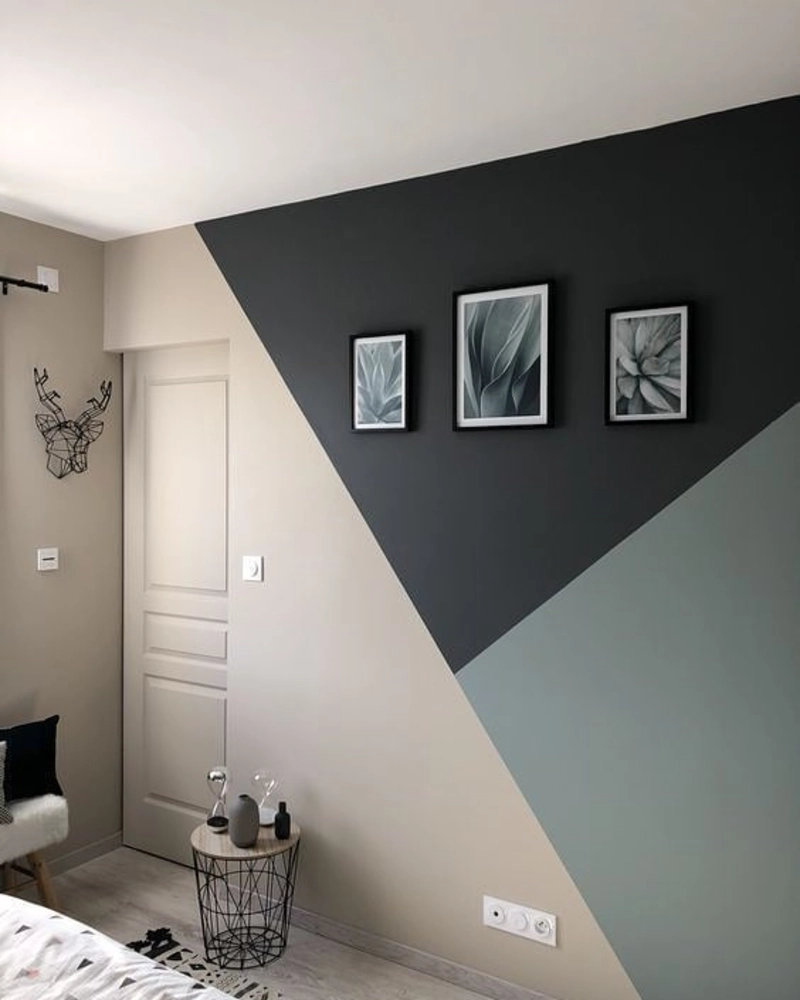 Geometric Tri-Color Diagonal Painted Wall with Black Framed Botanical Prints