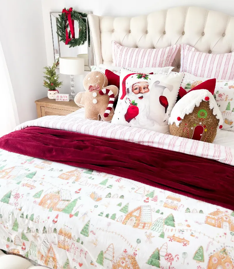 Gingerbread Village Bedding with Tufted Cream Headboard and Whimsical Shaped Pillows