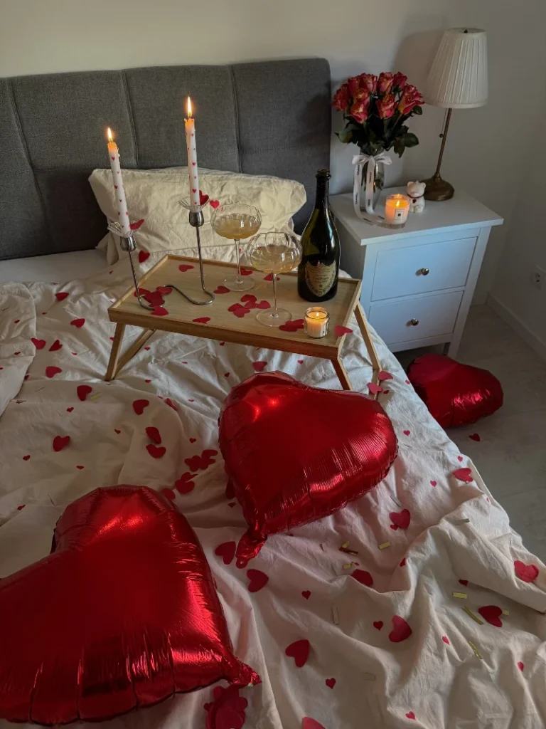 Gray Paneled Headboard with Bamboo Bed Tray and Metallic Crimson Balloons
