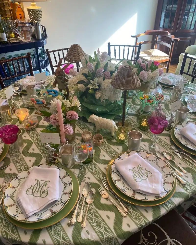 Green Ikat Tablecloth with Monogrammed Linens and Woven Lamps