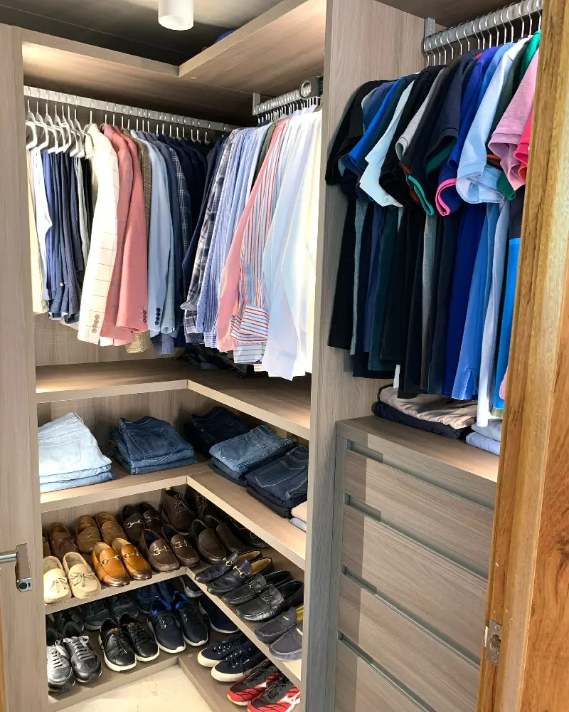 Light Oak Corner Closet with Categorized Hanging and Stacking