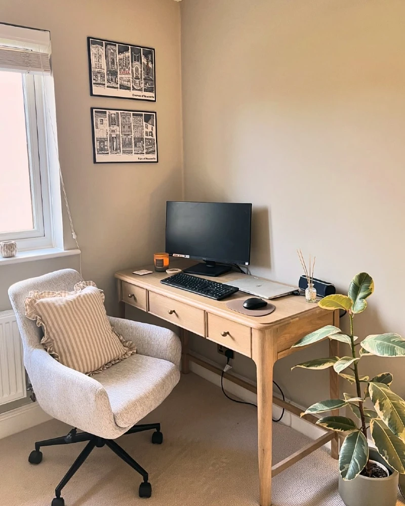 Light Oak Writing Desk with Soft Upholstered Chair and Window Corner