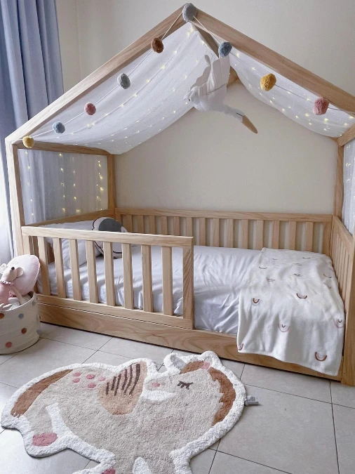 Light Wood House Bed With Playful Textures