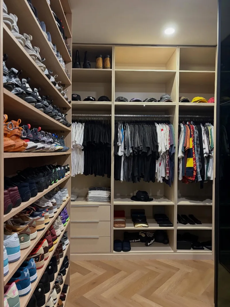 Light Wood Shelving with Extensive Side-Loading Sneaker Display