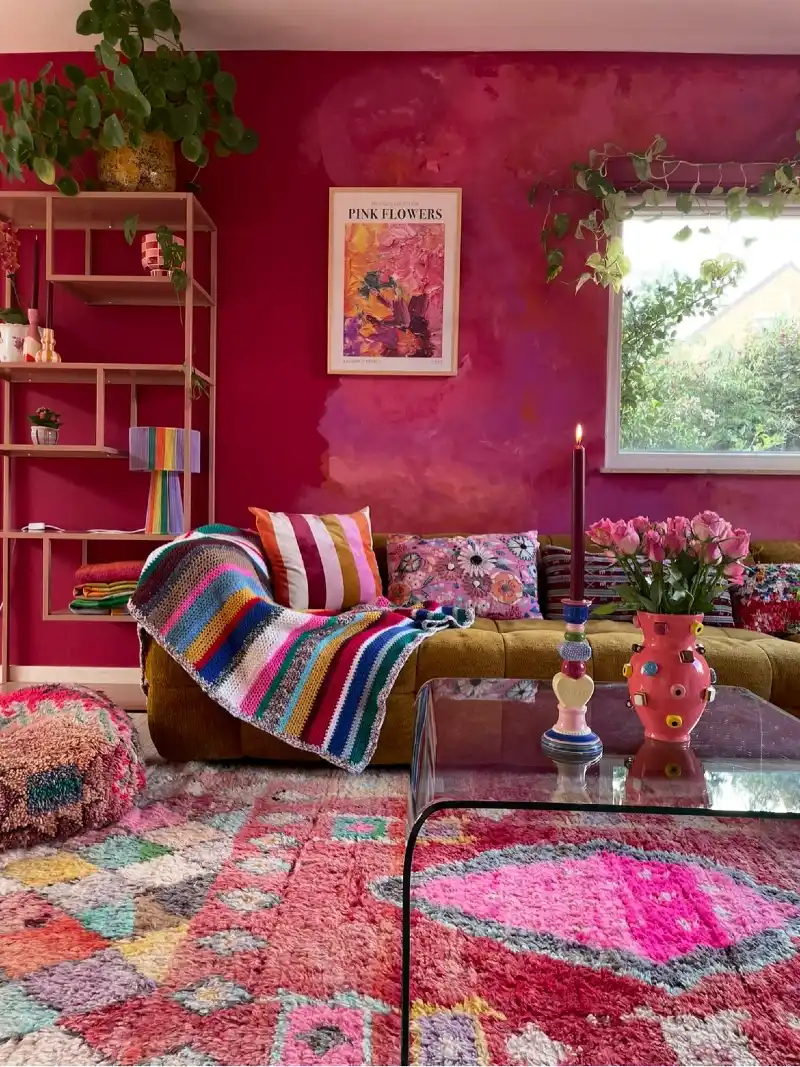 Magenta Watercolor-Effect Wall with Mustard Velvet Sofa and Striped Throw
