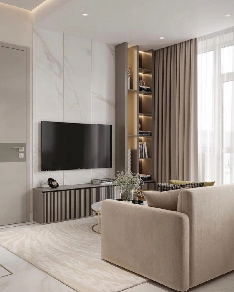 Marble TV Wall with Curved Sofa and Lighted Display Shelves