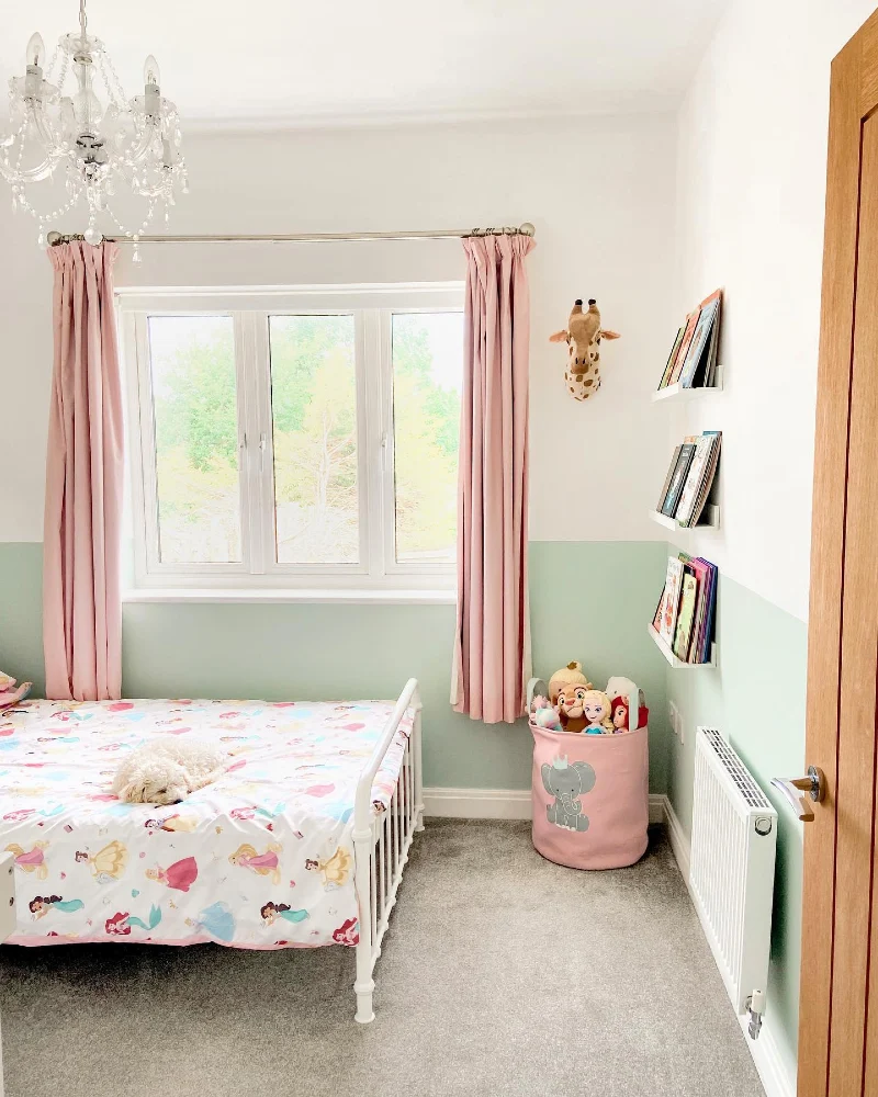 Mint Green Half-Painted Walls with Pink Curtains and White Spindle Bed
