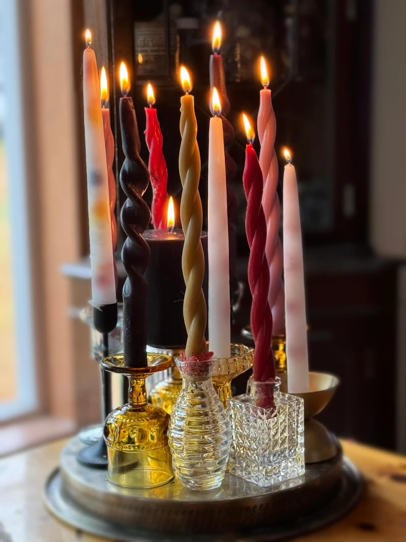 Mismatched Colored Glass Holders with Eclectic Twisted Tapers on a Rounded Metal Base