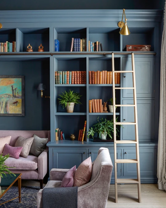 Moody Blue Library With Plush Velvet Seating