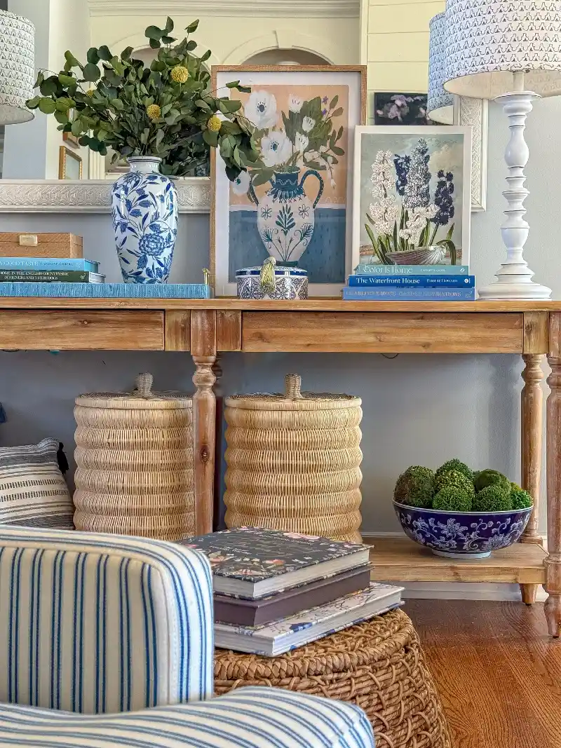 Natural Wood Console Table with Woven Baskets and Blue-and-White Decor