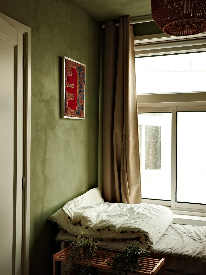 Olive Green Plaster Nook with Soft Textiles