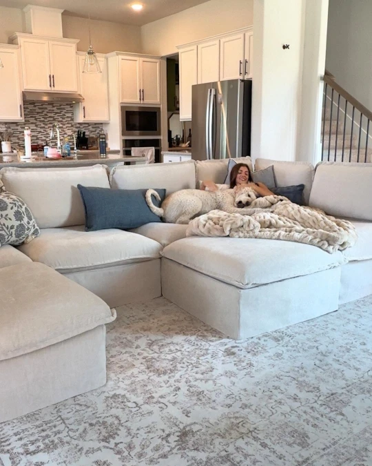Oversized Slipcovered Sectional Softens An Open Concept Space