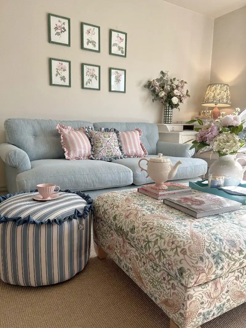 Pastel English Country Living Room with Floral Ottoman and Ruffled Accents
