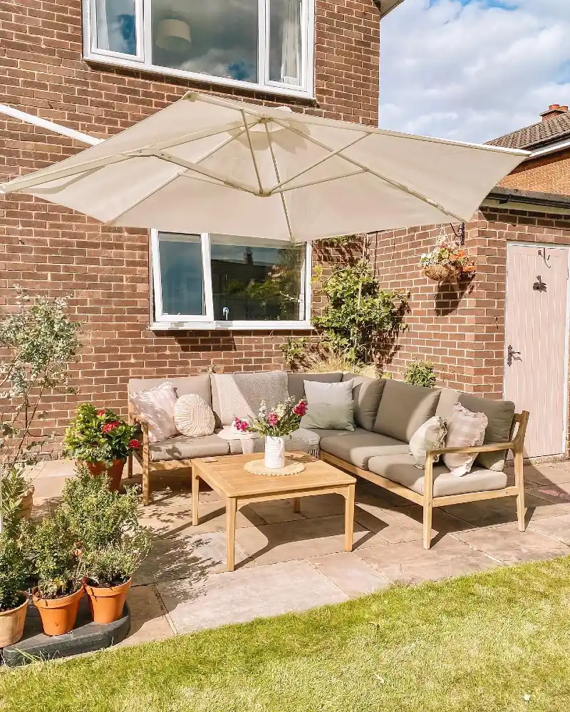 Patio Lounge with Oversized Cantilever Umbrella and Wooden Sofa Set