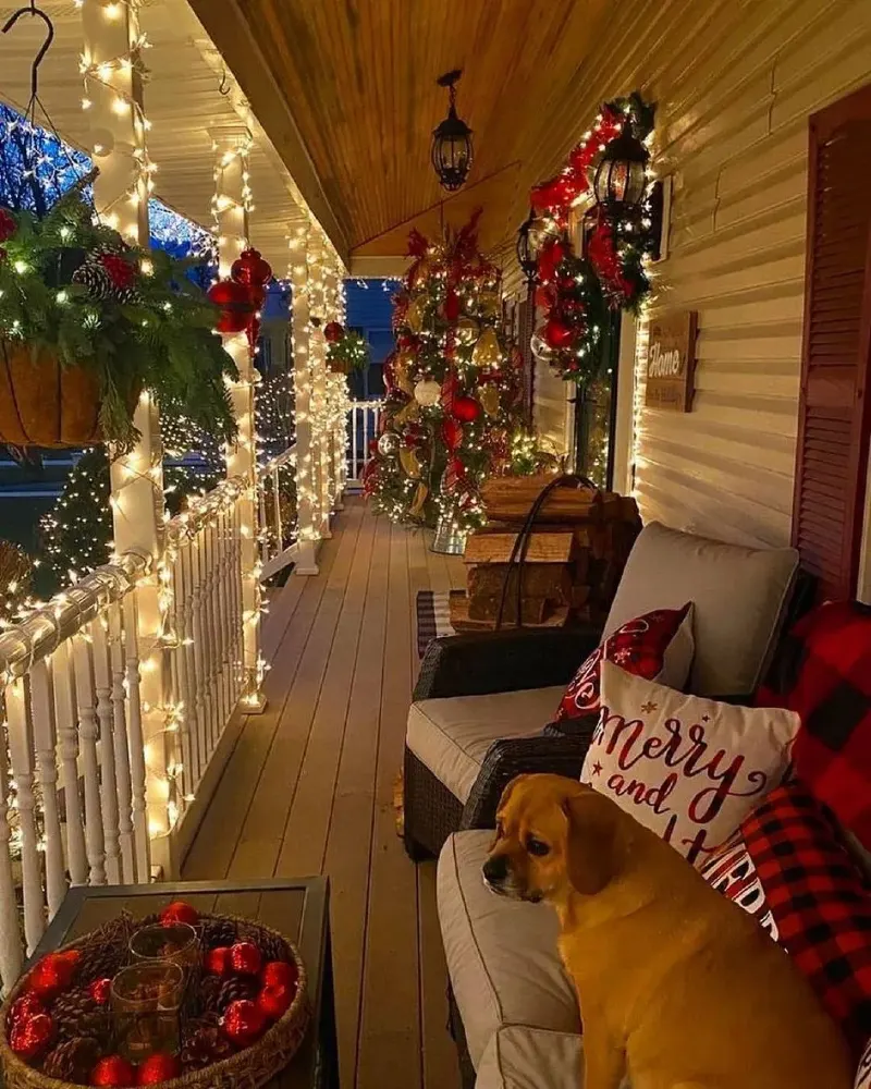 Pillar-Wrapped String Lights with Plaid Accent Pillows and Stacked Firewood Logs