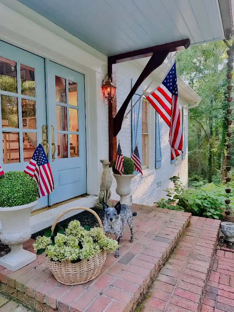 Powder Blue Double Doors with Boxwood Topiaries and Woven Basket Hydrangeas