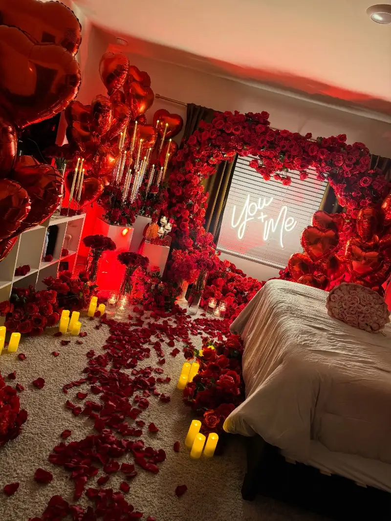 Red Rose Floral Arch with Neon Text Sign and Taper Candles