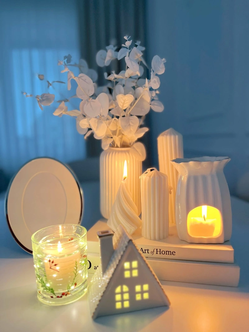 Ribbed Ceramic Vases with Matte White Pillars, Twisted Cones, and a Ceramic Wax Warmer