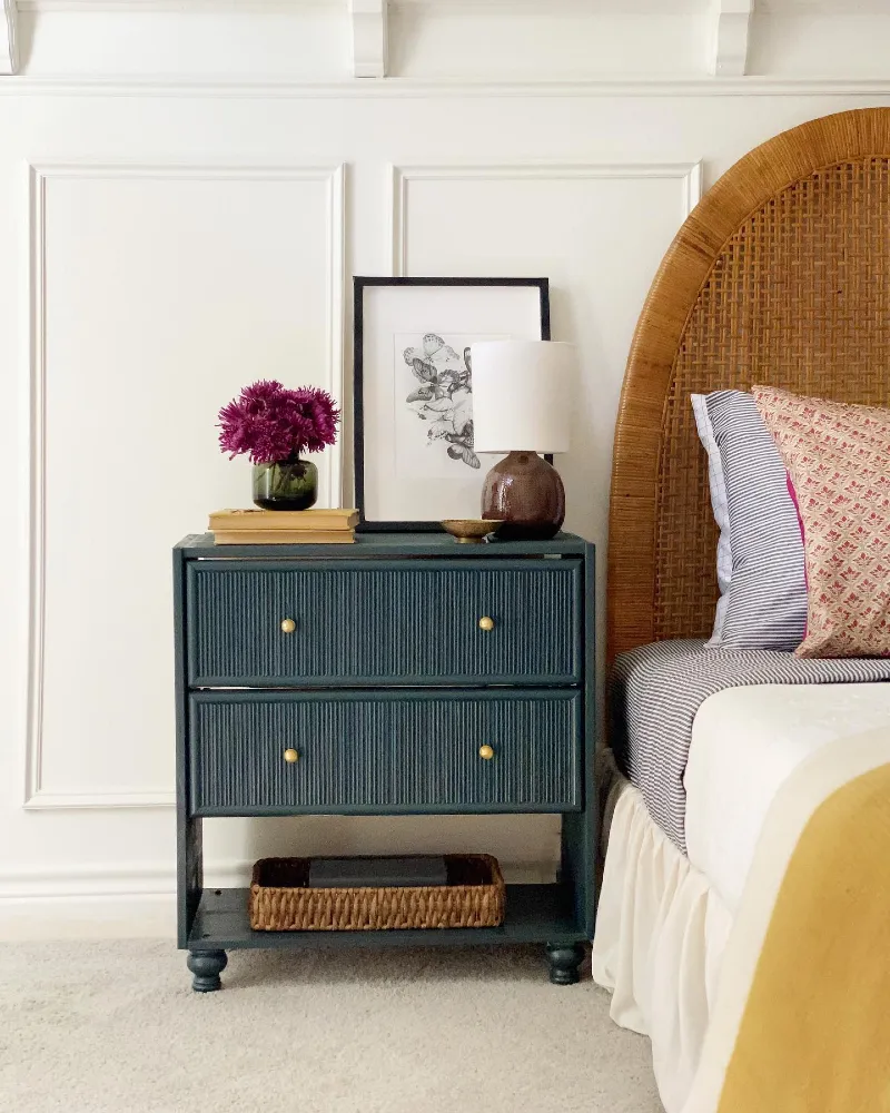 Ribbed Teal Nightstand with Brown Ceramic Lamp and Arched Woven Headboard