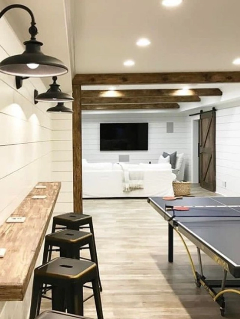 Rustic Shiplap Drink Rail with Gooseneck Barn Lights and Ping Pong Area