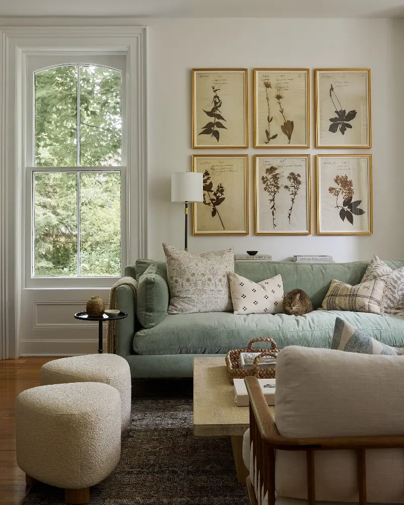 Sage Velvet Sofa with Grid Botanical Prints and Cream Bouclé Ottomans
