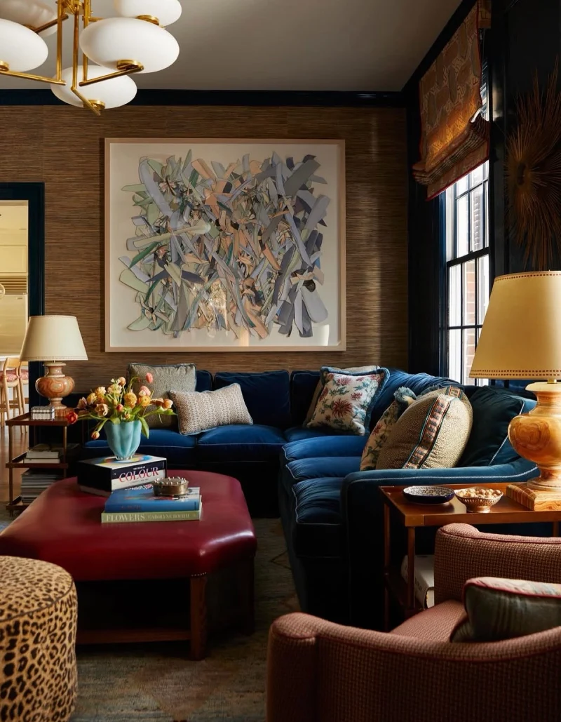 Sapphire Velvet Sectional with a Ruby Leather Ottoman