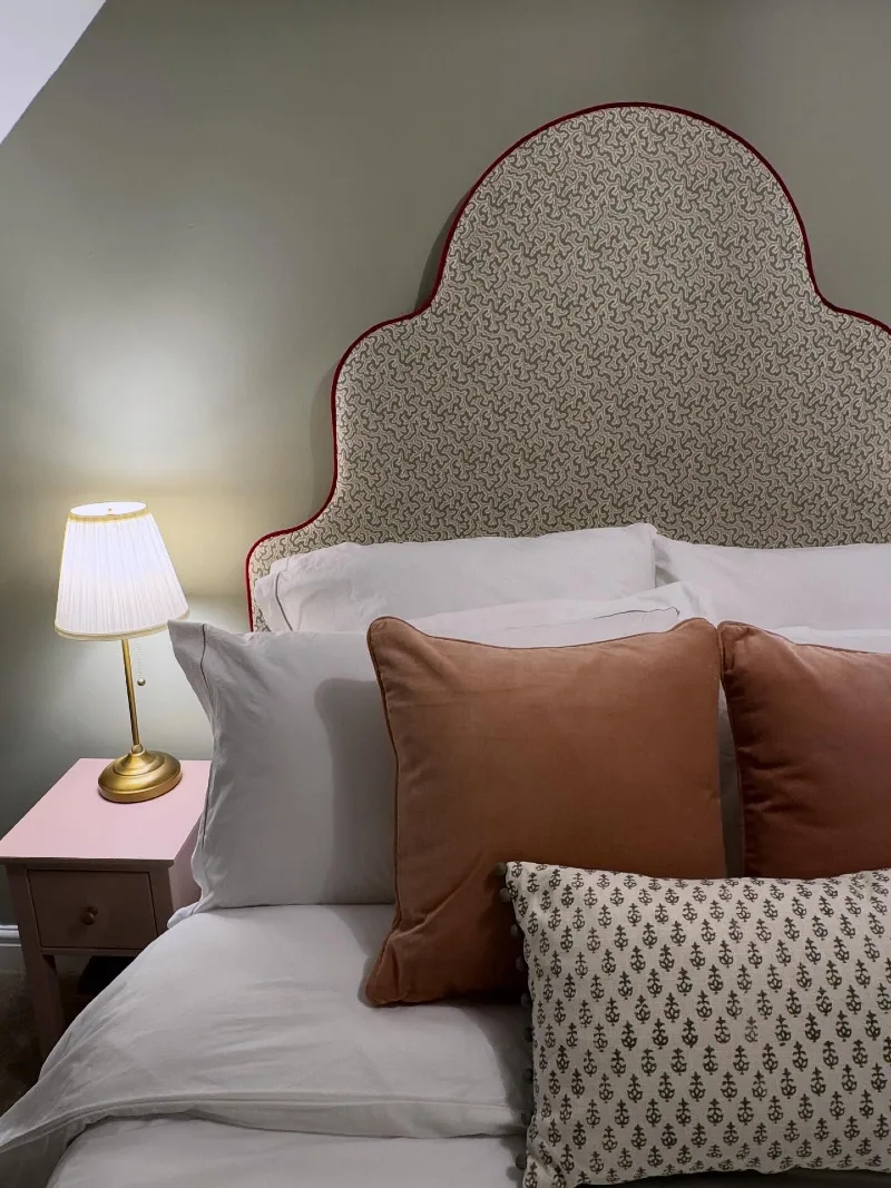Scalloped Patterned Fabric Headboard with Red Contrast Piping