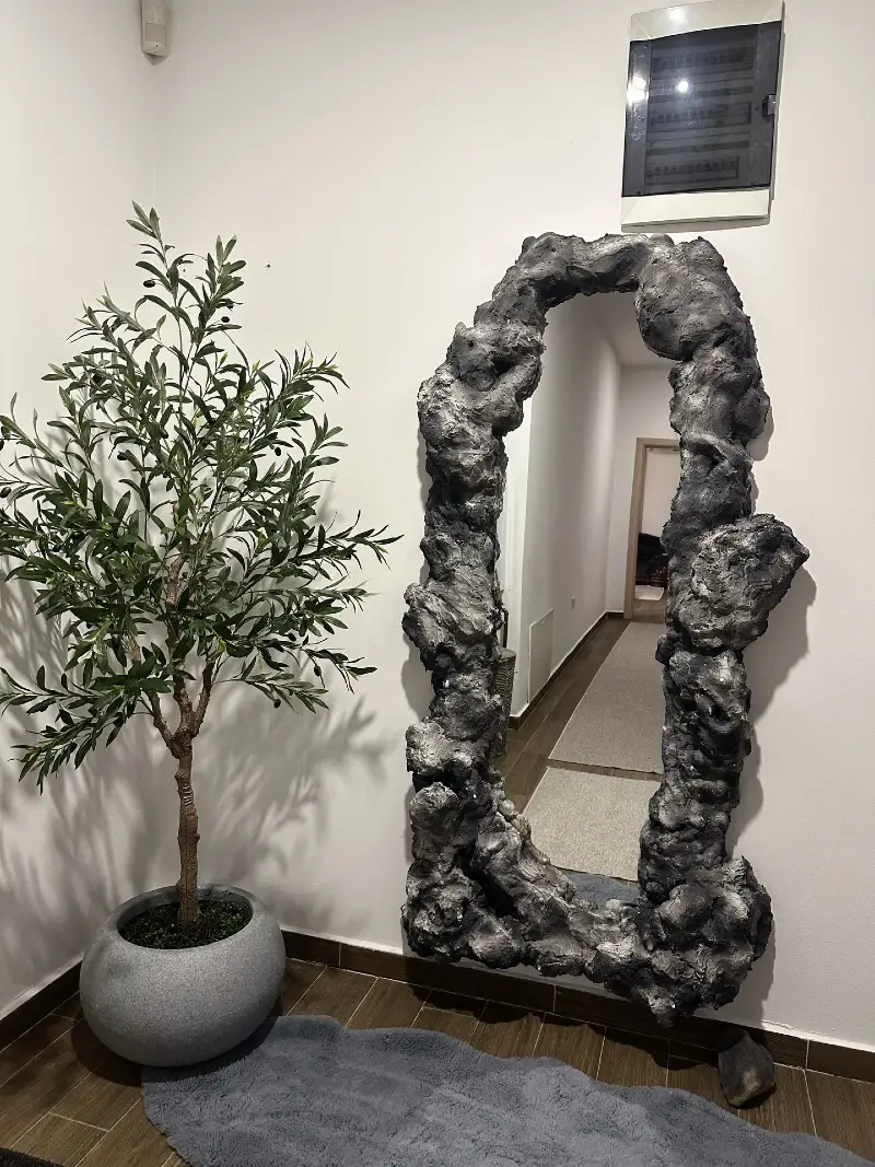 Sculptural Floor Mirror with Raw, Dark Stone-Textured Frame