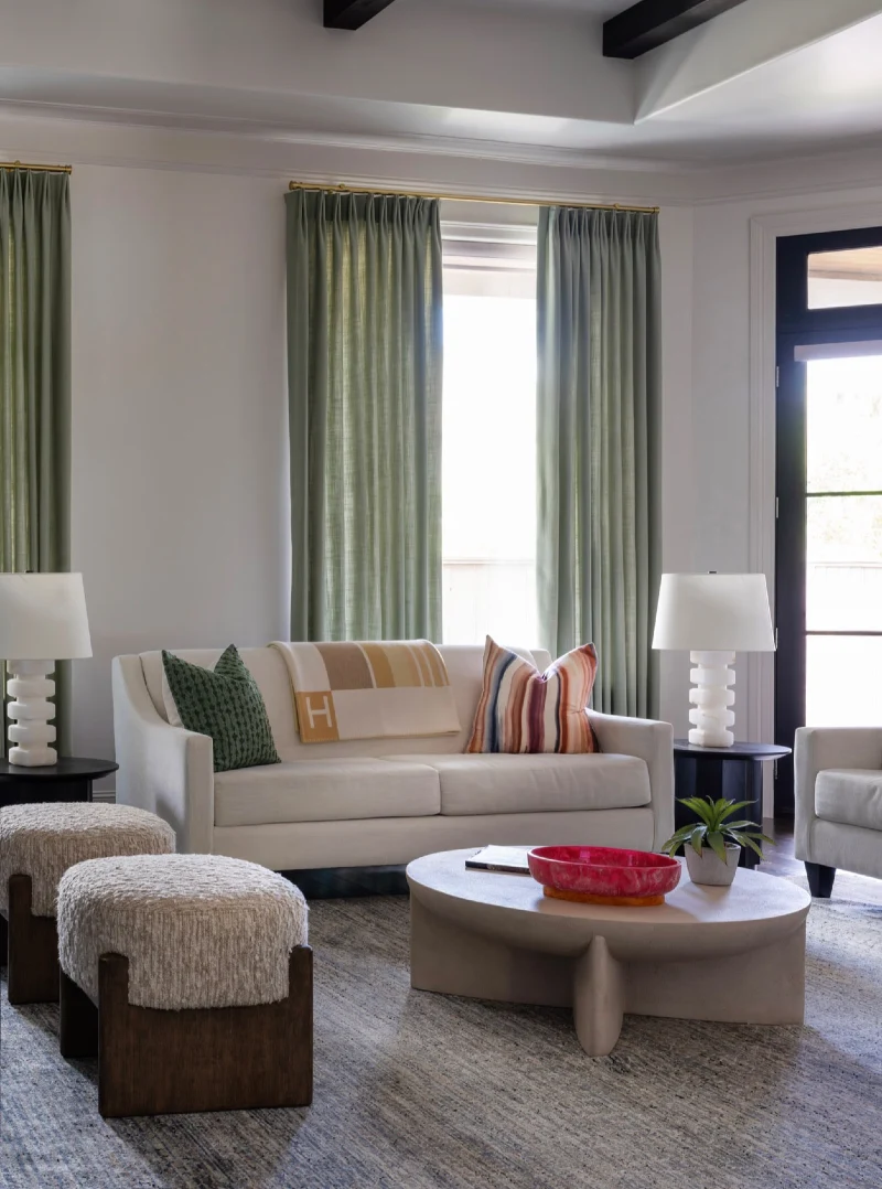 Sculptural Plaster Coffee Table with Bouclé Stools and Sage Drapery