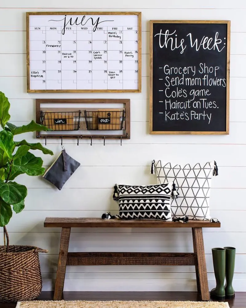 Shiplap Wall Entryway Station with Wooden Bench and Framed Chalkboard