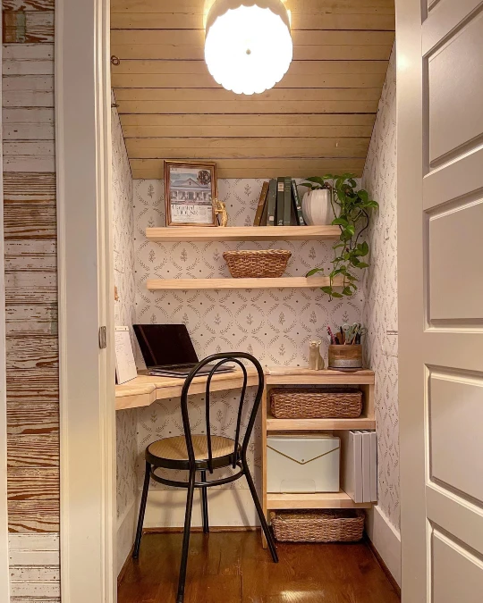 Slanted Ceiling Nook Hides a Cottage Style Desk