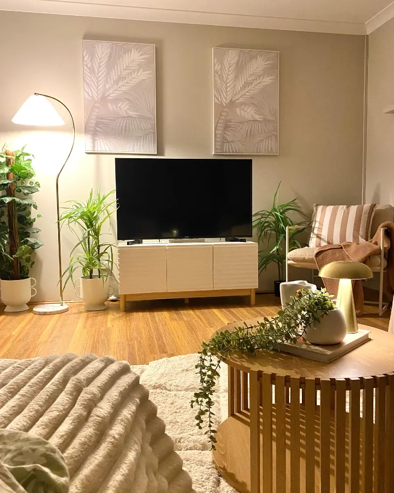 Slatted Wooden Coffee Table with Gold Mushroom Lamp and Symmetrical Palm Canvas Prints