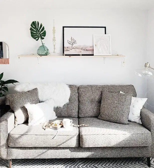 Slim Picture Ledge With Minimalist Art And Greenery