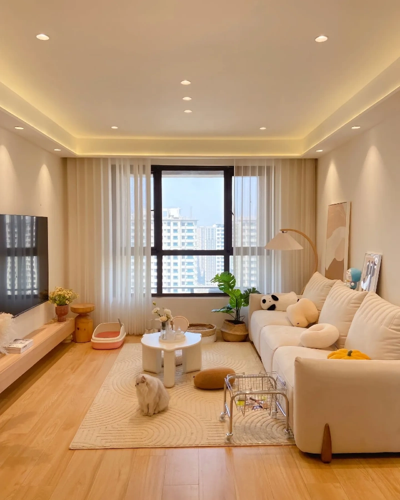 Soft Neutral Apartment with Full Width Window Wall
