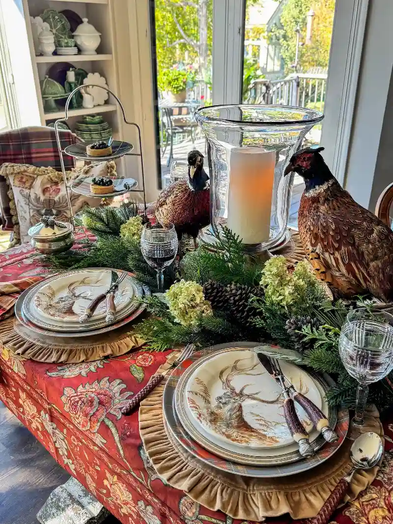 Stag-Motif China with Pheasant Figurines and Evergreen Swag