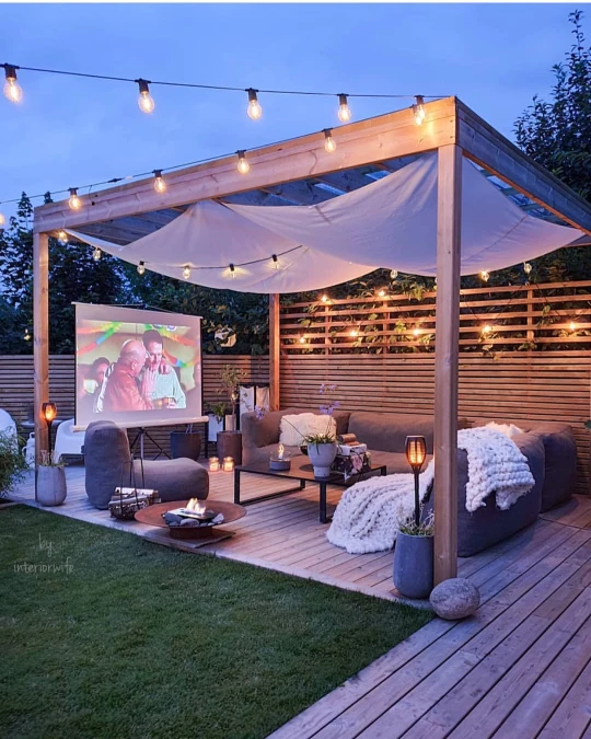 Structured Pergola Lounge With Drapery
