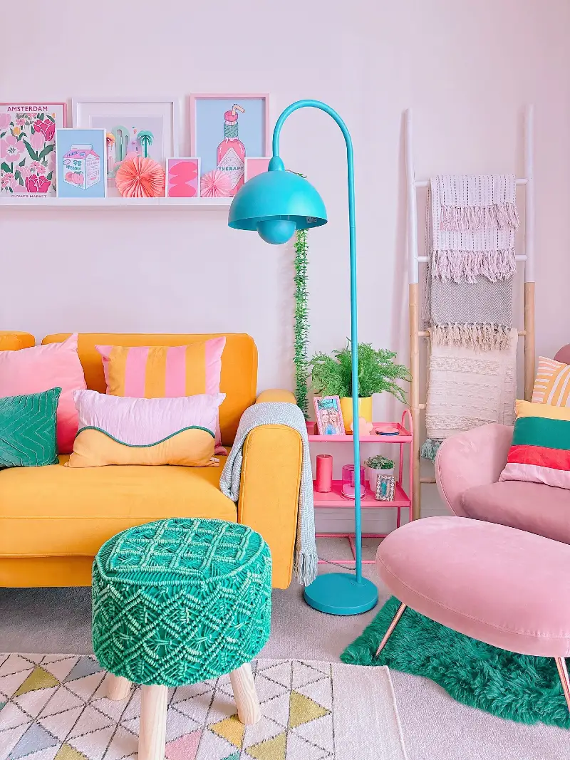 Sun-Drenched Living Space with Mustard Sofa, Teal Accents, and Macramé Pouf