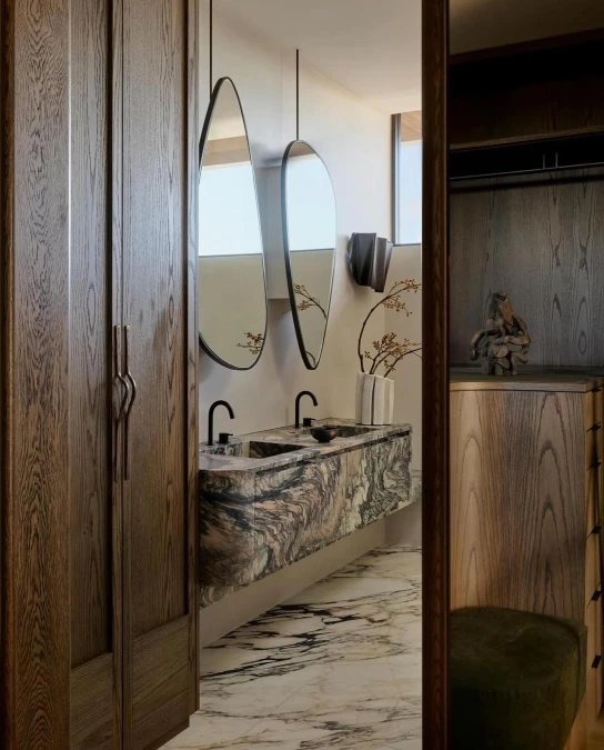 Sweeping Marble Veins and Suspended Mirrors