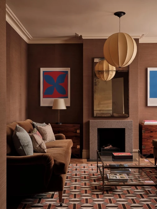 Textured Walls And Bold Art Bring Life To Brown Rooms