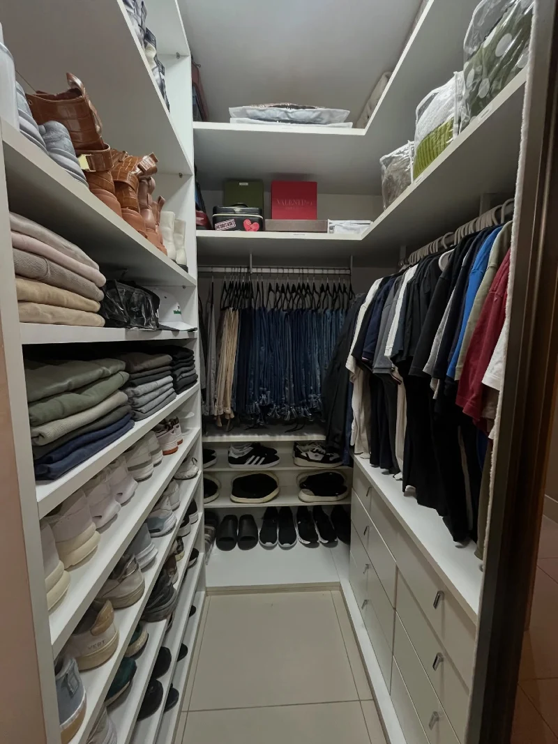 U-Shaped Closet with Open Footwear Shelving and High-Reach Storage