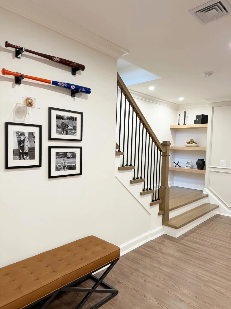 Wall-Mounted Bat Display with Tufted Leather Entry Bench