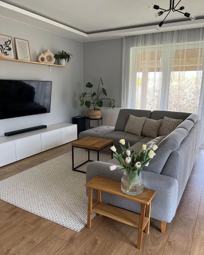 Wall Mounted TV with Floating Shelf and Centered Sectional